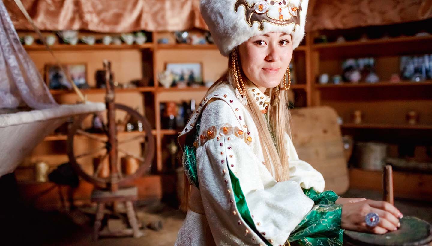 Kyrgyzstan - Young Woman in Traditional Yurt Dwelling